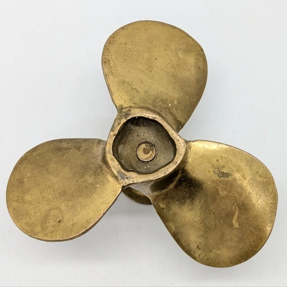 Vintage brass propeller candle holder and snuffer